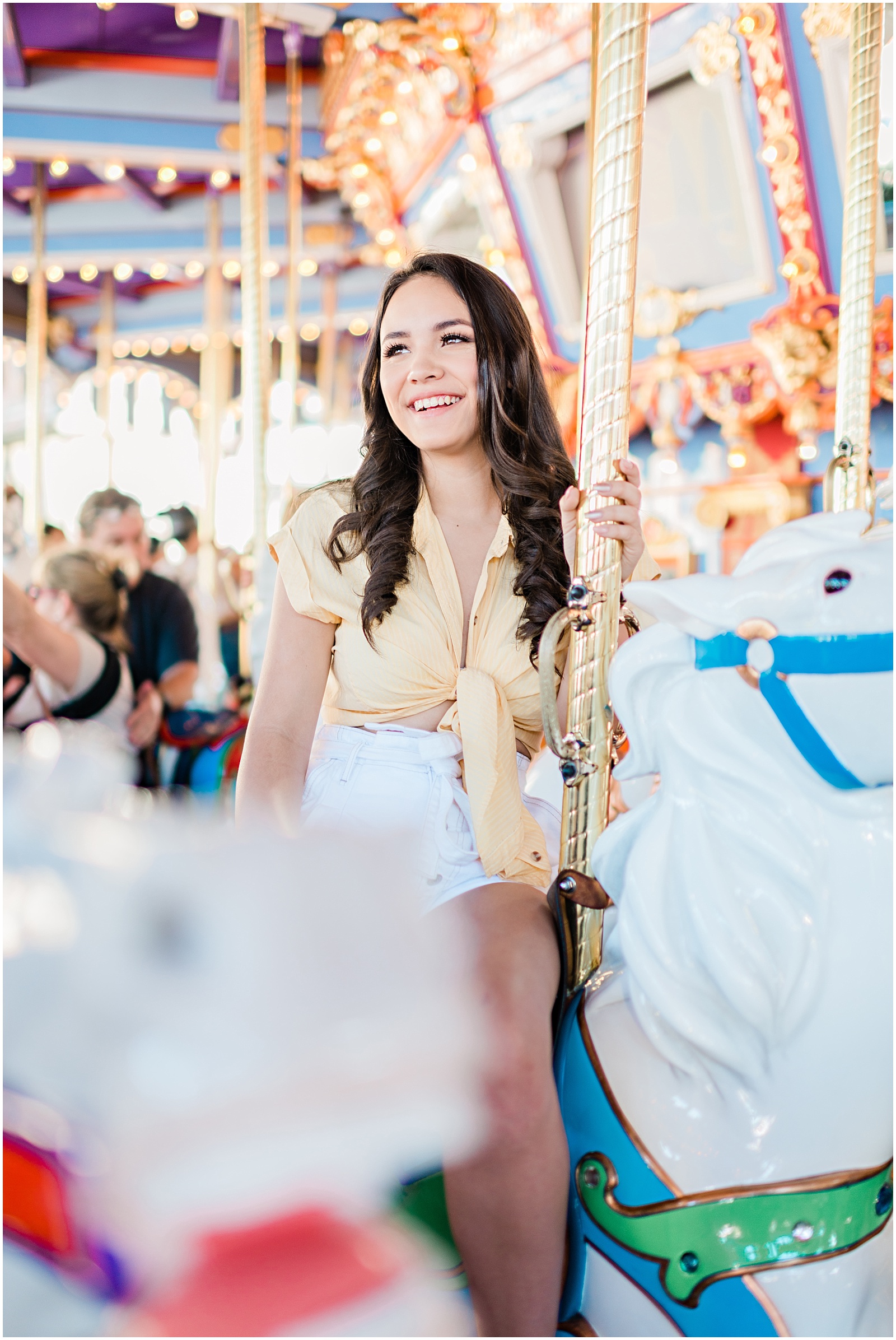 Disneyland Carousel Senior Session.Images by Mollie Jane Photography. To see more go to www.molliejanephotography.com.