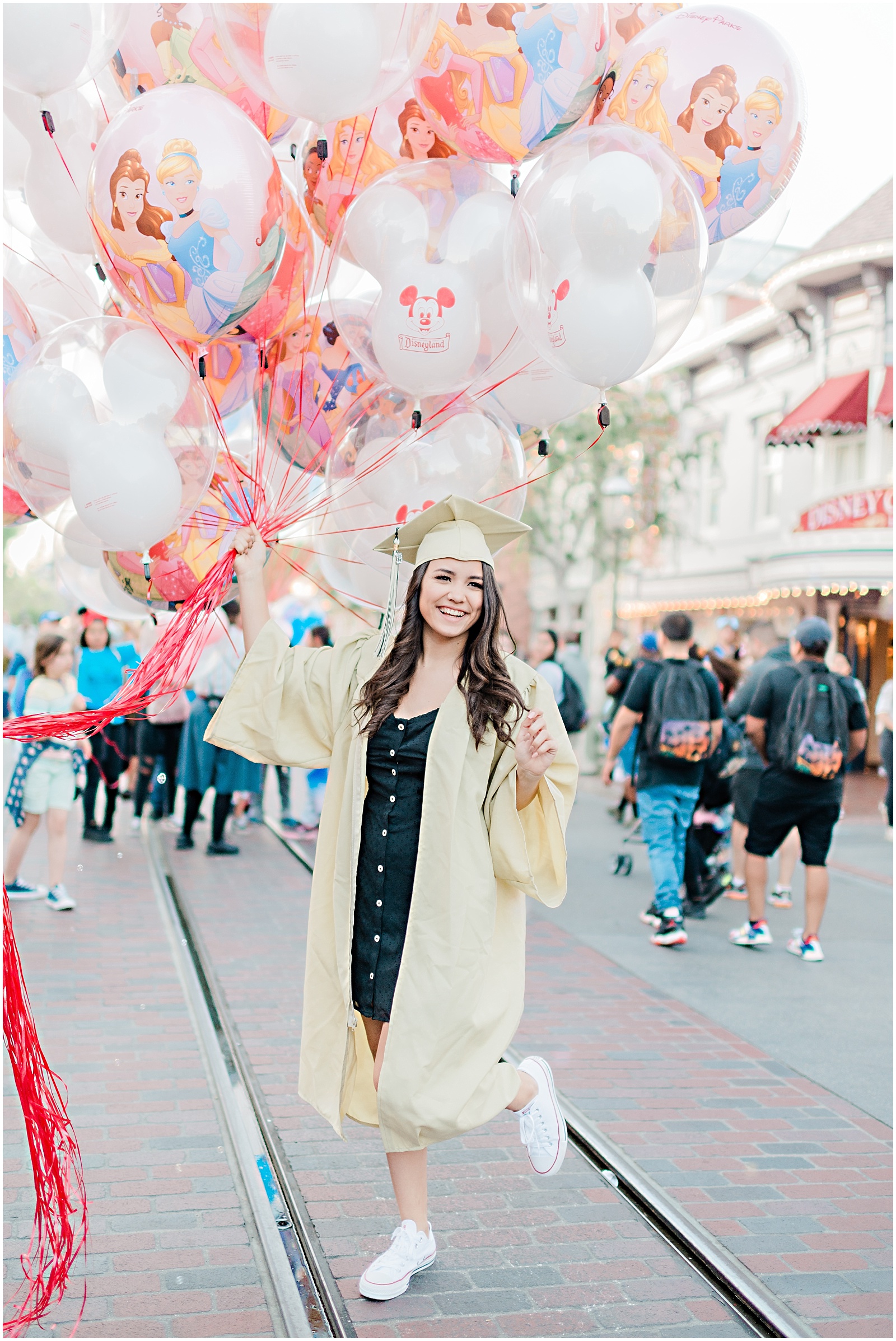 Disneyland Main Street Senior Session. Images by Mollie Jane Photography. To see more go to www.molliejanephotography.com.