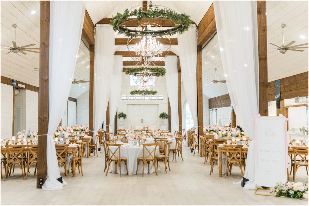 Elegant reception lighting inside Chandler Oaks Wedding Venue barn