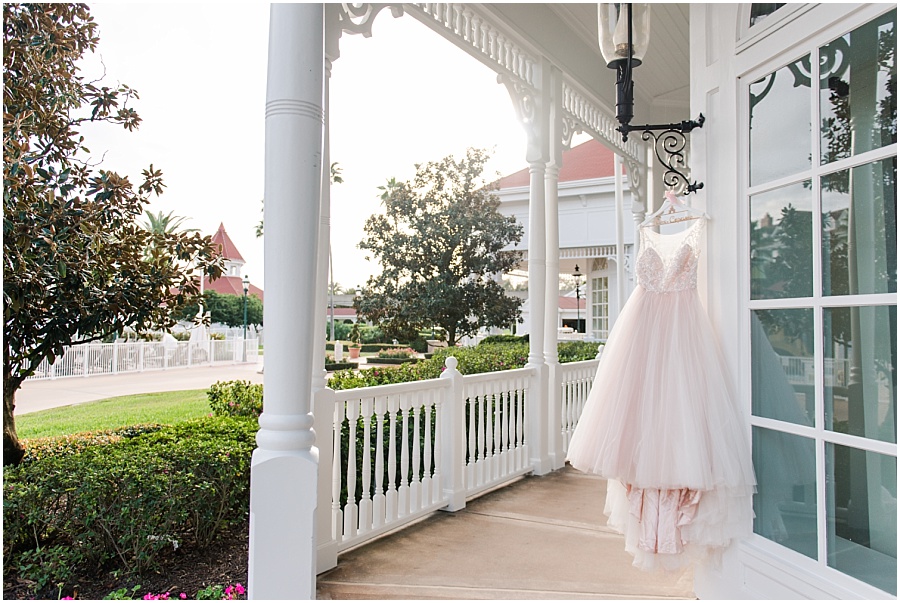 Wedding dress hanging at the Grand Floridian for her romantic wedding in Epcot at the Italy Pavilion