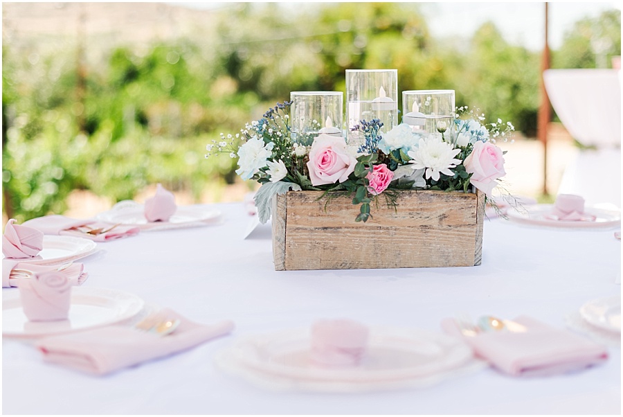 Wedding reception at an Escondido Airbnb with pink and blue details.