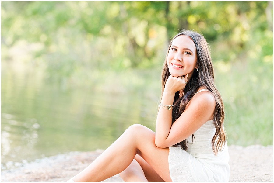 Houston high school senior photo session by a lake in Cypress, Texas
