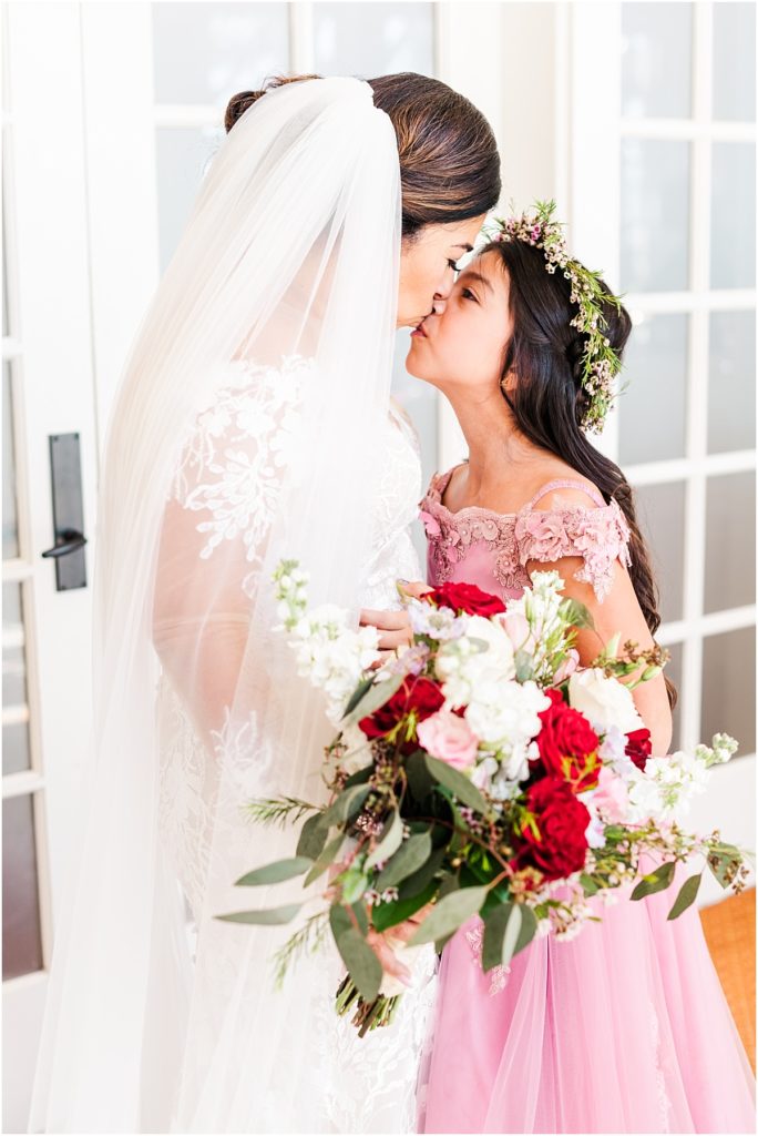 Flower girl first look with bride at the Galvez Hotel