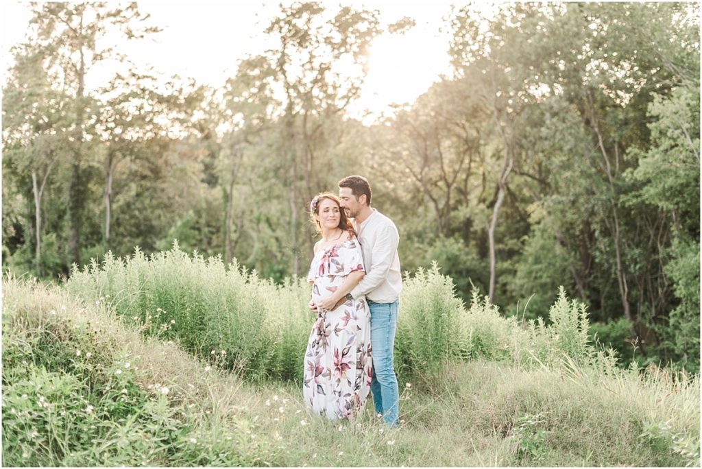 Houston maternity session in a field with flower dress