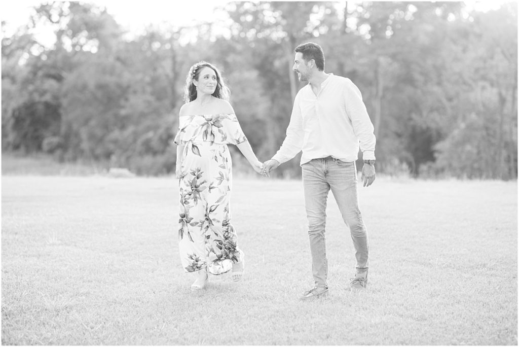 Houston Maternity session walking through a field