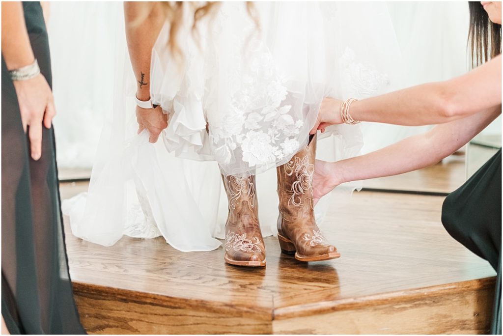 Bridal Suite getting ready in cowboy boots at The Springs Wallisville.