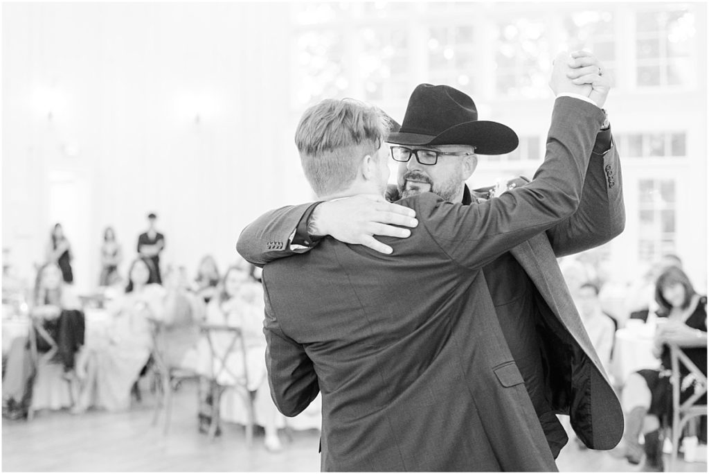 Father and Son dance during the reception at The Springs Wallisville.