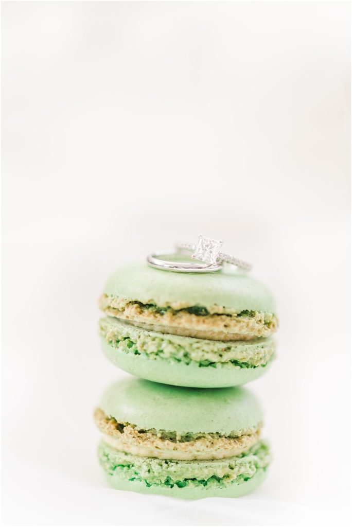 Wedding rings on green macaroons