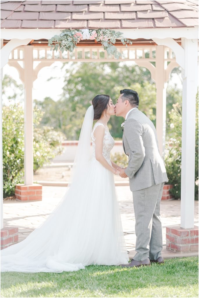 Southern California wedding ceremony with white gazebo
