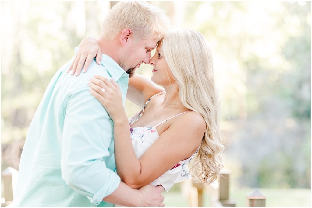 Cy-Hope Engagement Session on a bridge with hanging Spanish moss