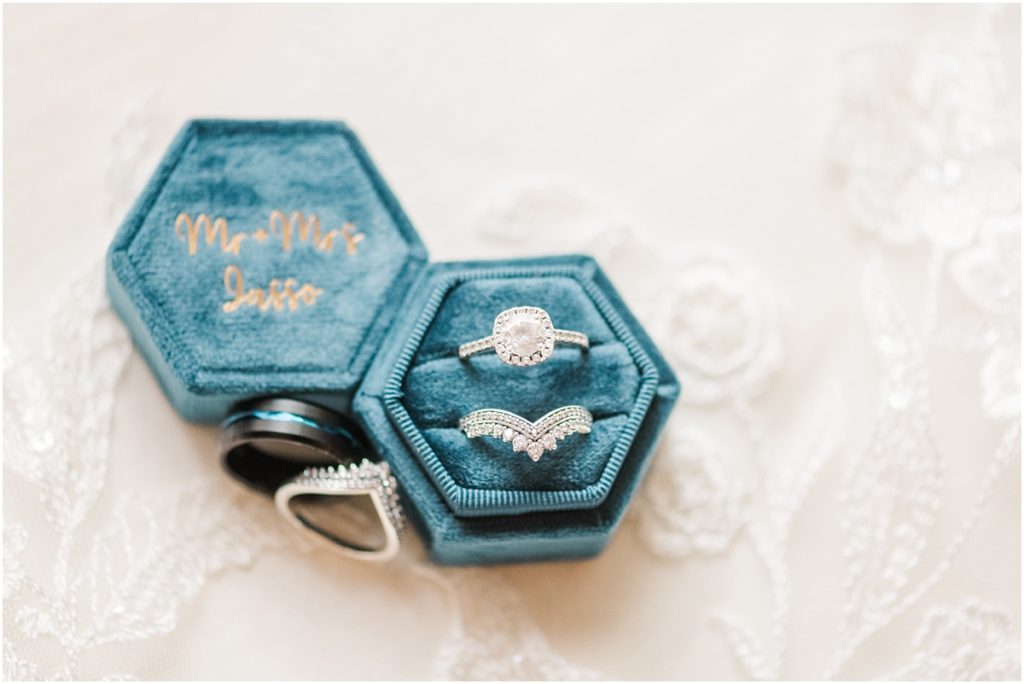 Wedding ring set with blue velvet ring box at Shirley Acres