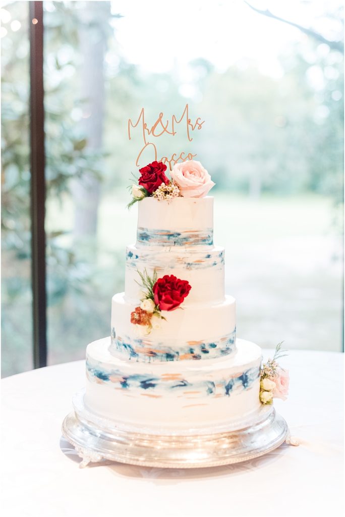 Wedding cake with blue and gold watercolor