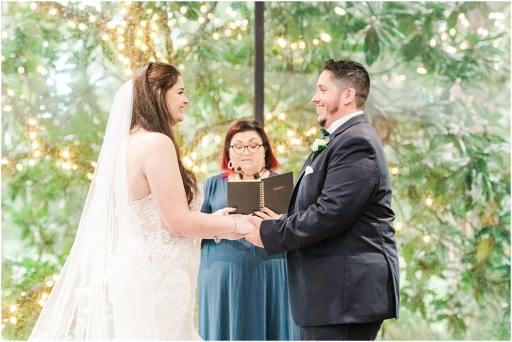 Indoor rainy day wedding ceremony at Shirley Acres in Houston