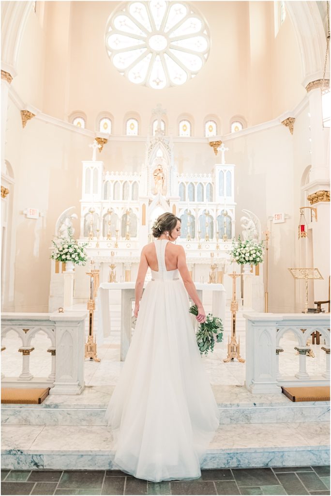 Bride inside of St. Joseph's Catholic church in Houston