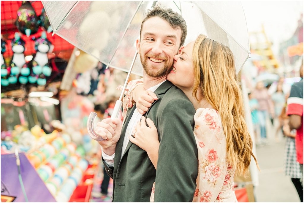 Clear umbrella at an engagement session