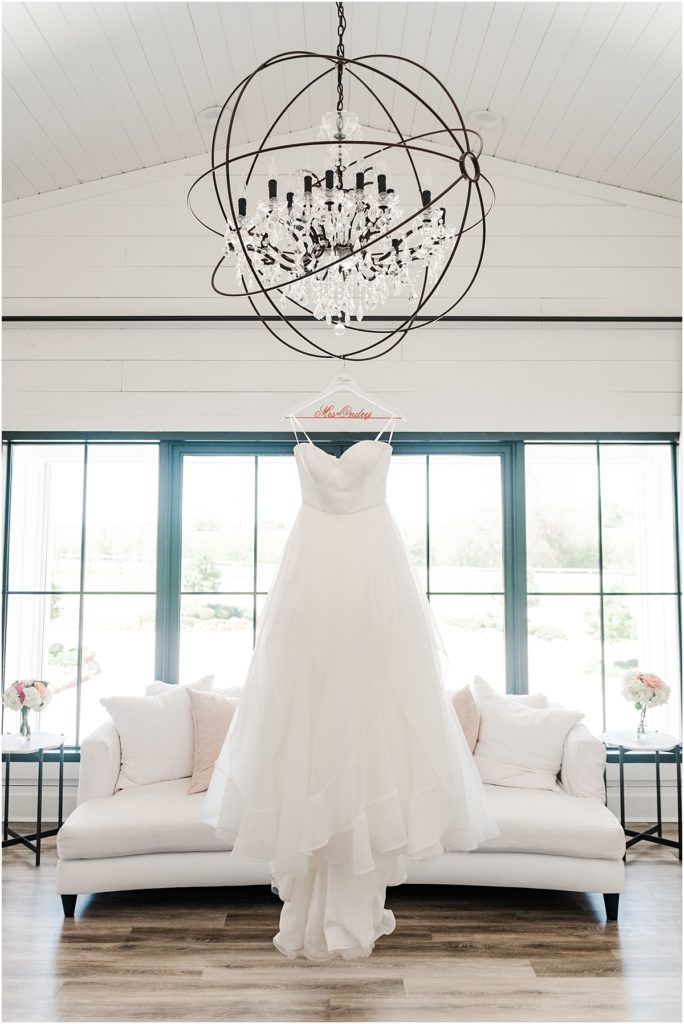 Dress hanging in The Farmhouse bridal Suite