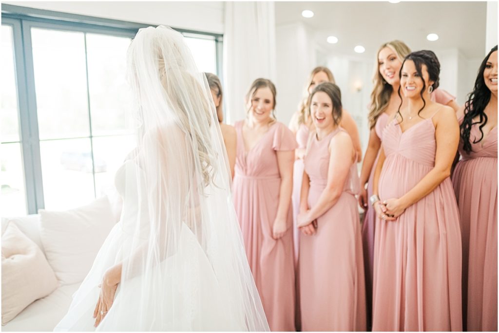 First look with bridesmaids in The Farmhouse bridal suite