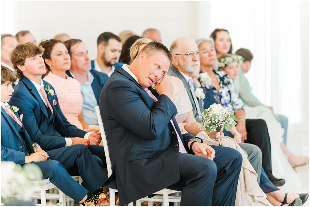 Emotional dad at Wedding Ceremony in the chapel at the Farmhouse