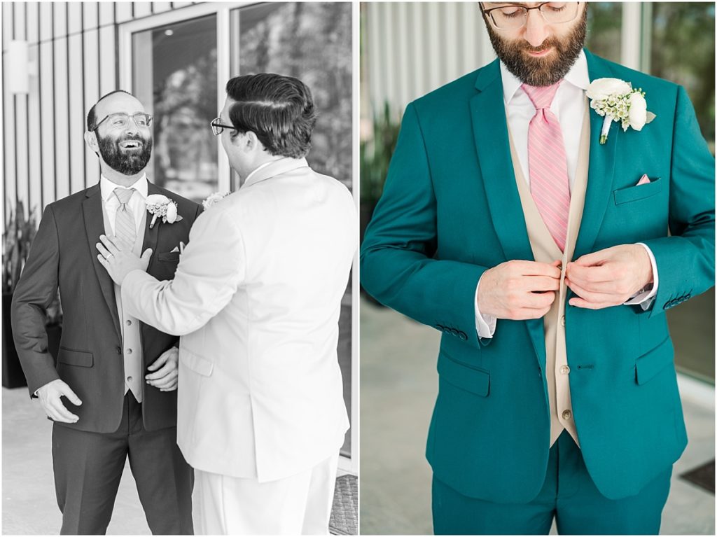 Groom getting ready in teal suit and pink tie