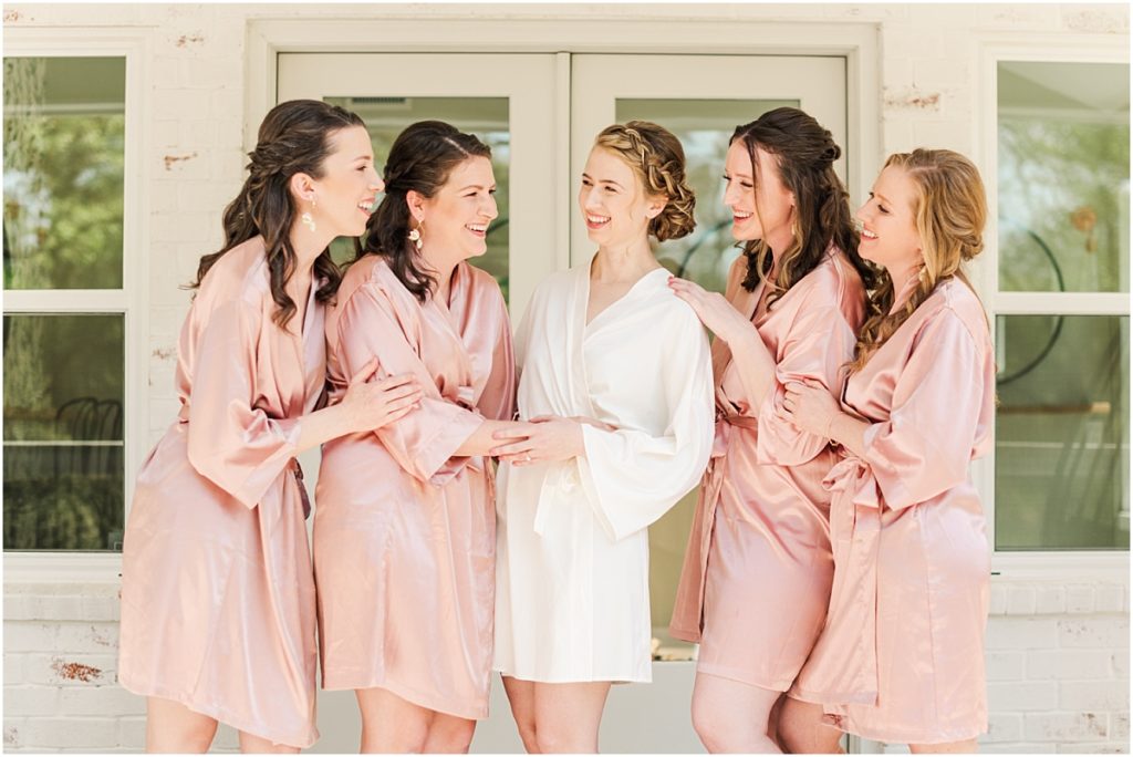 Bride getting ready with bridesmaids at Forever 5 Events