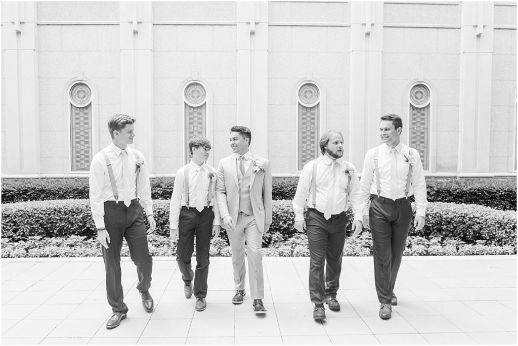Groomsmen walking at the Houston LDS Temple