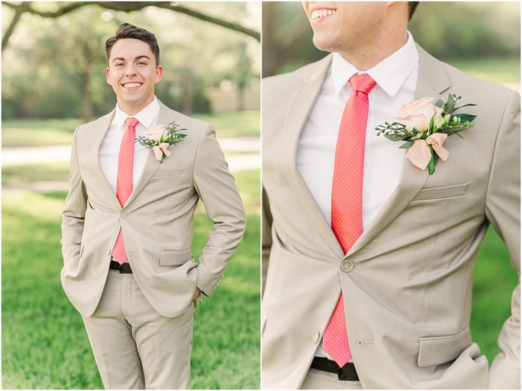 Groom pictures with a coral tie and peach florals