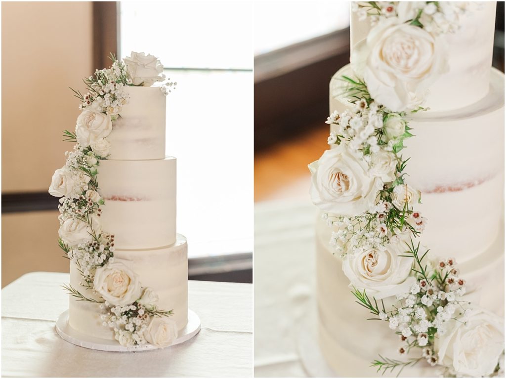Naked cake with white flowers