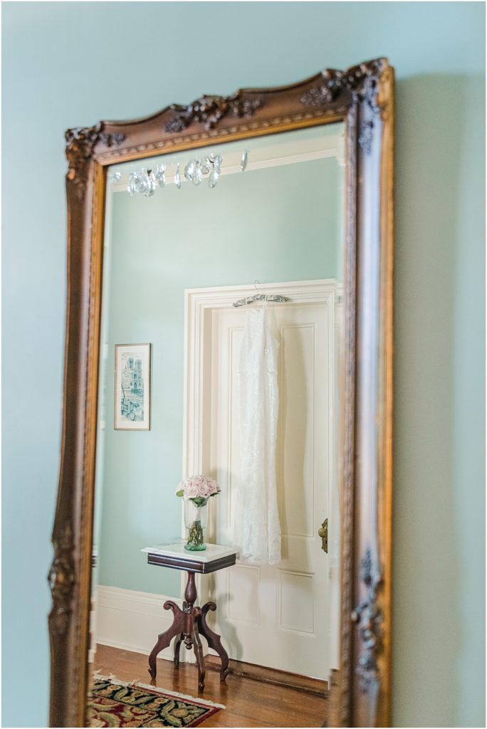Wedding dress reflection in mirror