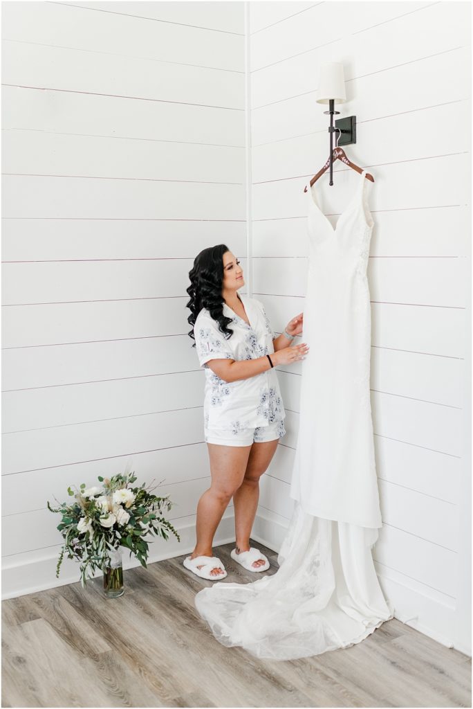 Wedding dress hanging in The Framhouse bridal suite