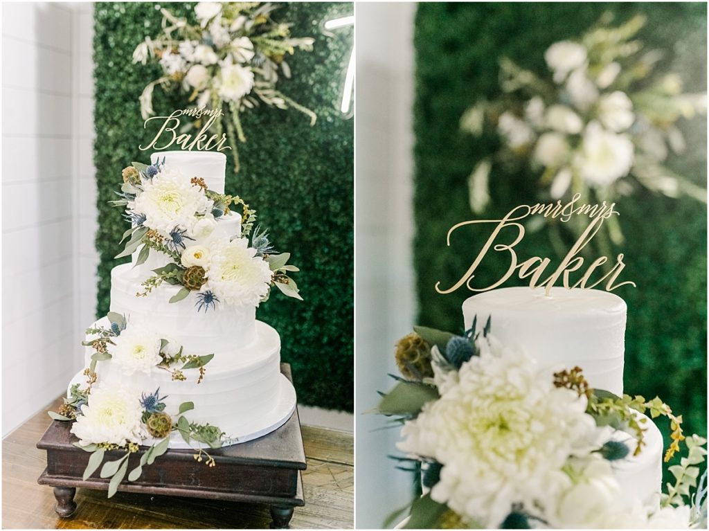 White wedding cake with dusty blue and green floral details