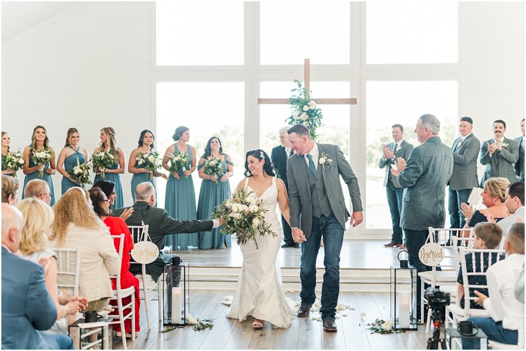 Wedding recessional in The Farmhouse chapel