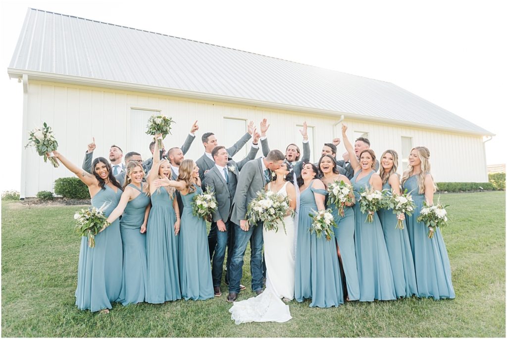 Wedding party in dusty blue dresses and ties