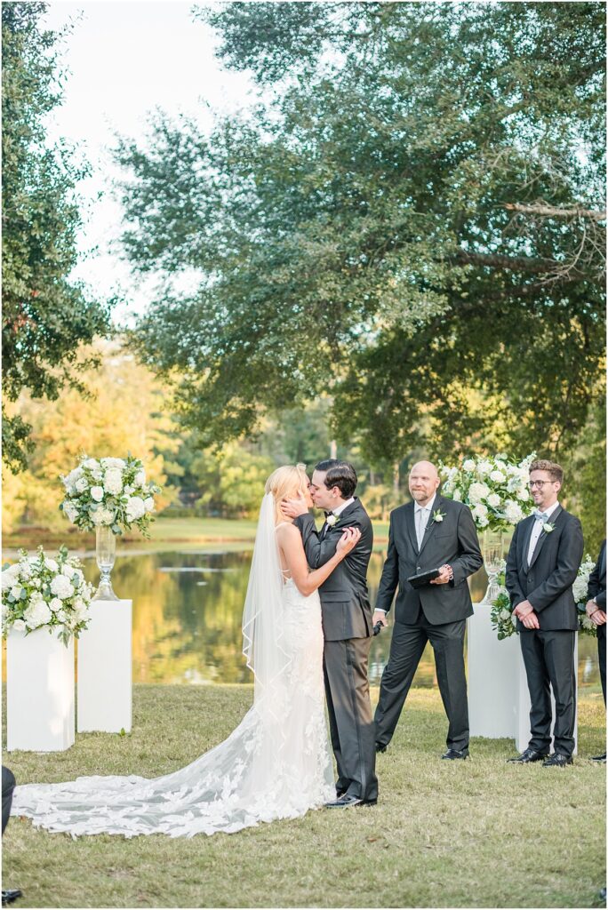 Bride and Groom first kiss at their Houston wedding ceremony