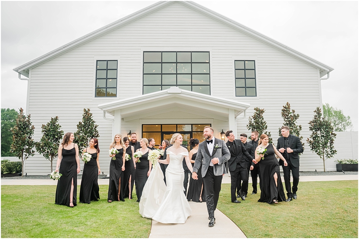 Wedding party in all black at Boxwood Manor