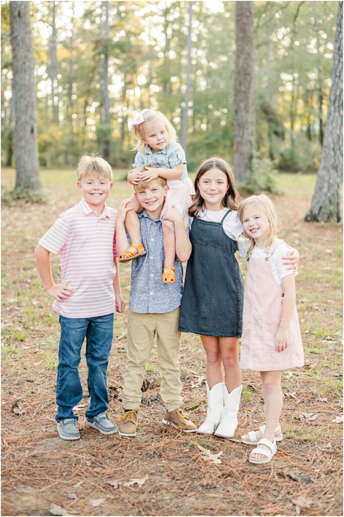 Pictures of children in a St. Augustine Park during the fall