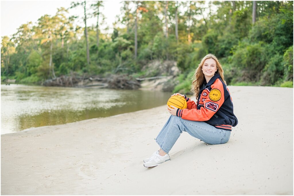 Water polo senior picture in Jacksonville florida in a creek.