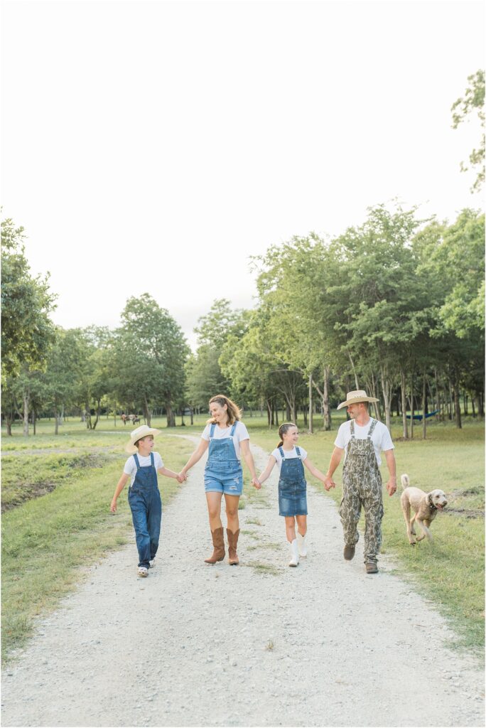 Walking on the farm for their family pictures in Houston