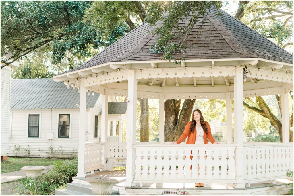 senior pictures in jacksonville florida in a white gazebo