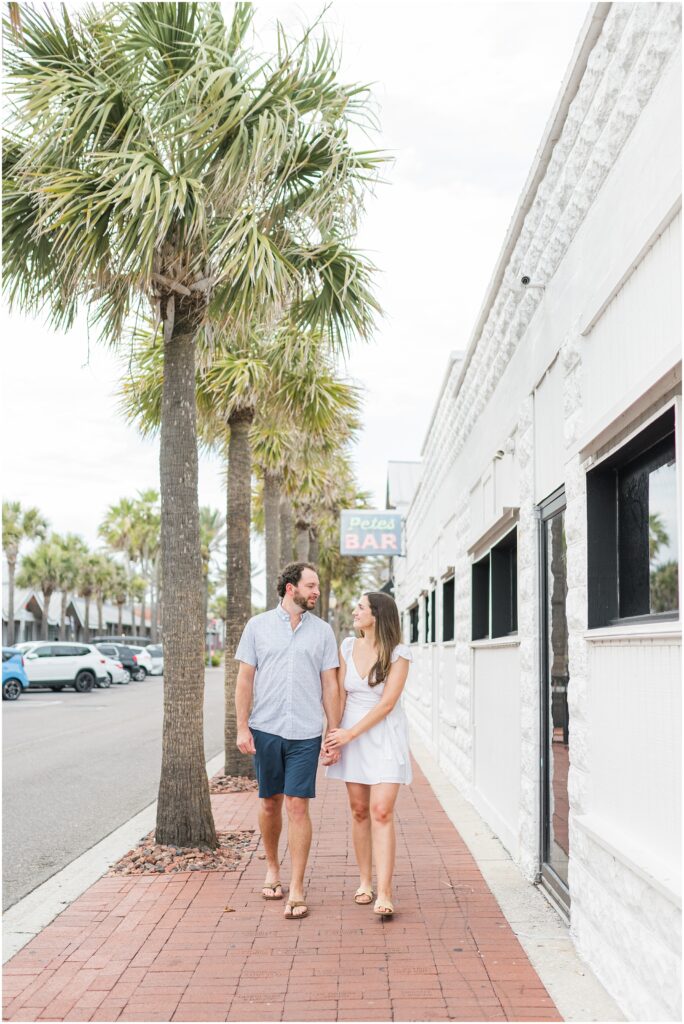 Engagement session in front of pete's bar in Neptune Beach
