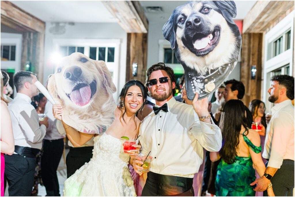 On the dance floor with Big Heads of their dogs.